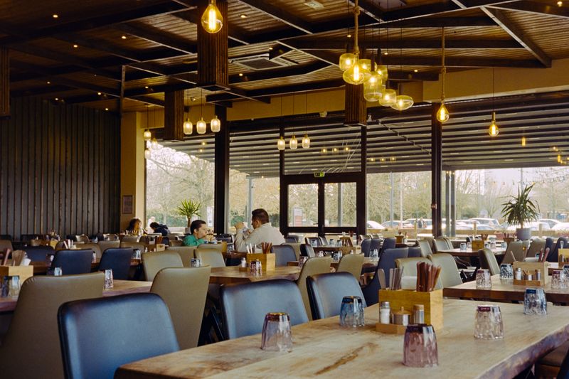 Cozy restaurant interior — dave hot chicken dining experience in Surprise, AZ